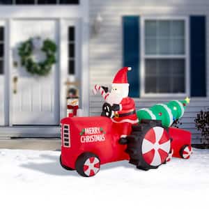 11 ft. Lighted Inflatable Santa on Tractor Decor