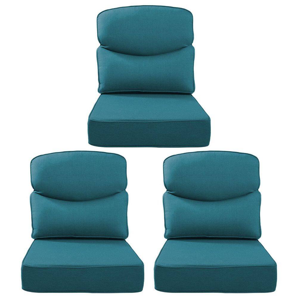 6-piece peacock green outdoor cushions stacked and arranged.