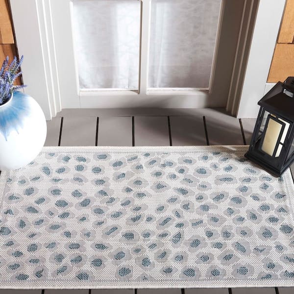 Courtyard Ivory/Blue 2 ft. x 4 ft. Geometric Cheetah Indoor/Outdoor Area Rug