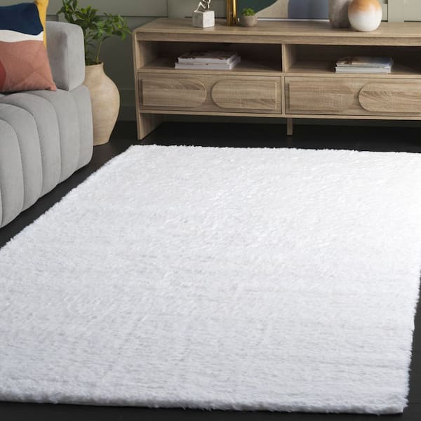 Toronto Shag 6 ft. x 9 ft. Ivory Solid Color Area Rug
