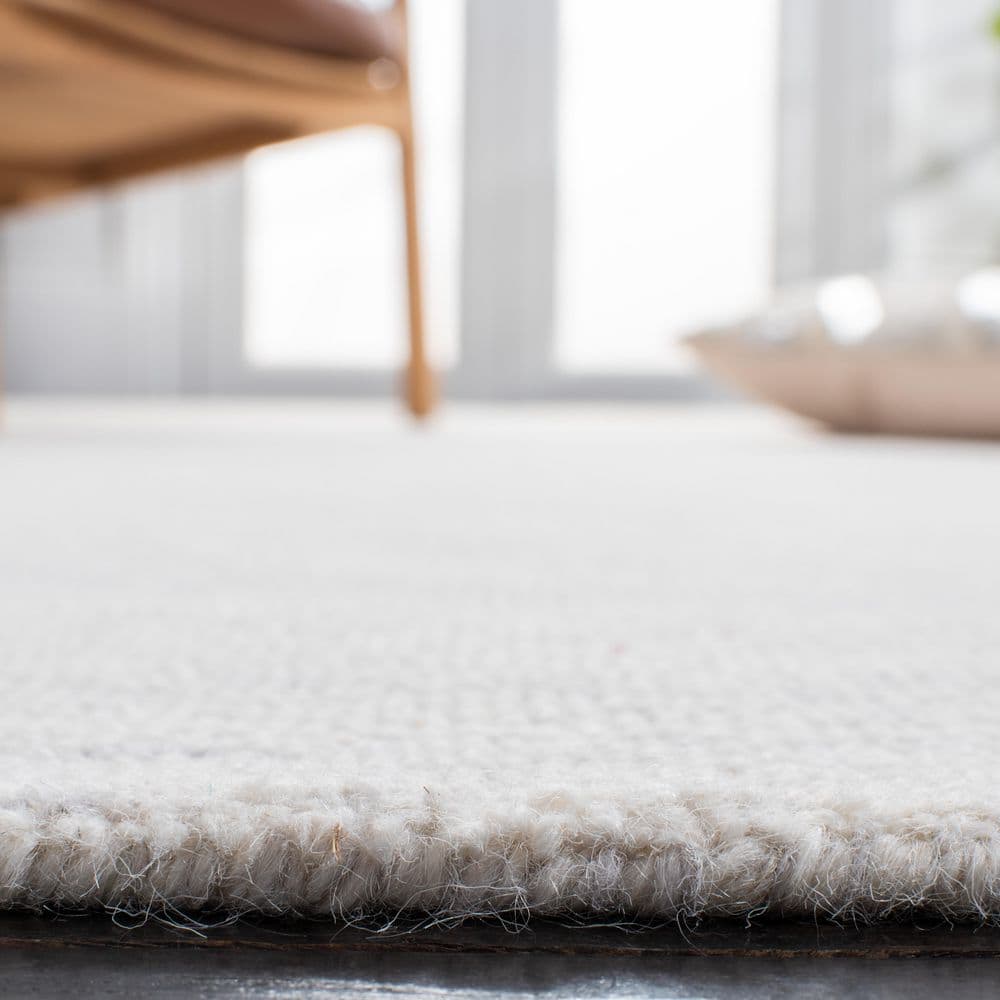Ivory Hand-Tufted Wool 8' x 10' Area Rug
