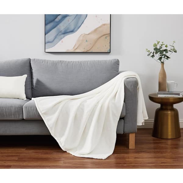 Cannon Solid Plush Ivory Polyester 50 in. x 60 in. Throw Blanket
