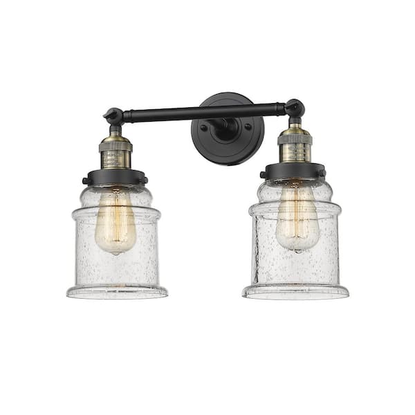 Canton 16.5 in. 2 Light Seedy, Black Antique Brass Vanity Light with Clear Glass Shade