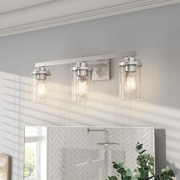 Designers Fountain Jedrek 24 in. 3-Light Brushed Nickel Industrial Vanity Light with Clear Glass Shades
