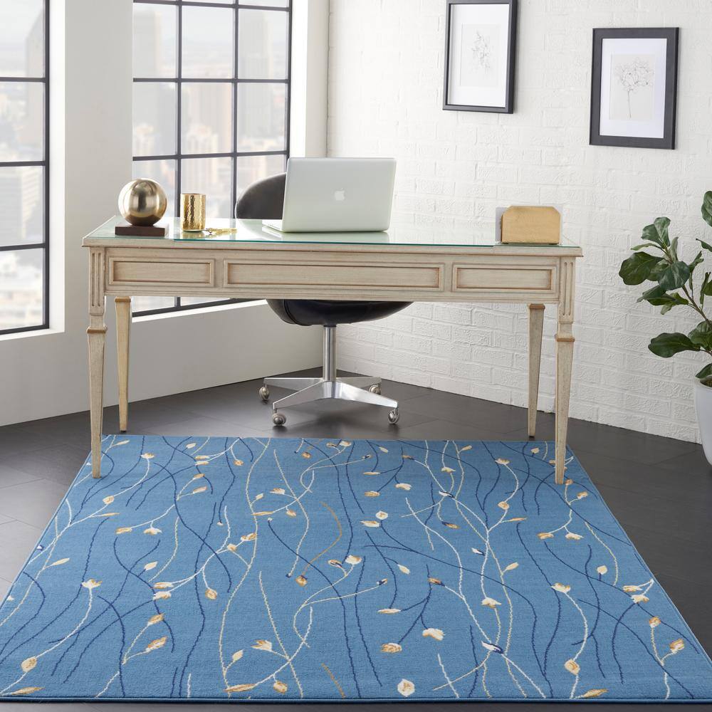 Light Blue Floral Synthetic 5' x 7' Area Rug