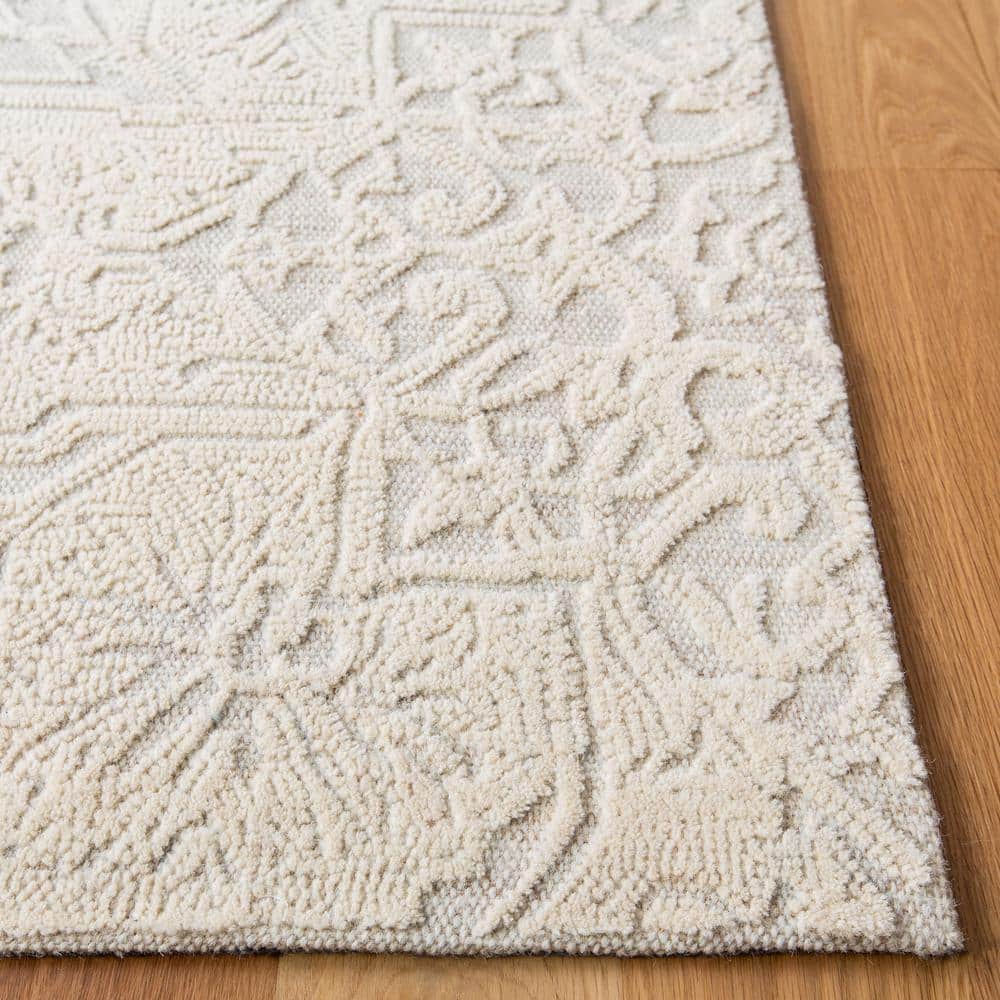 Ivory and Beige 4' x 6' Handmade Wool Abstract Tufted Rug
