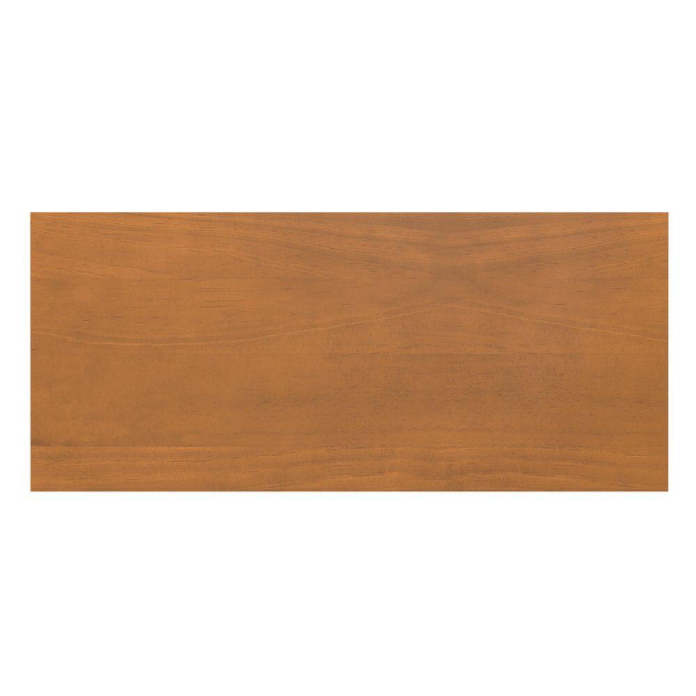 Close-up of the light golden brown wood grain surface.