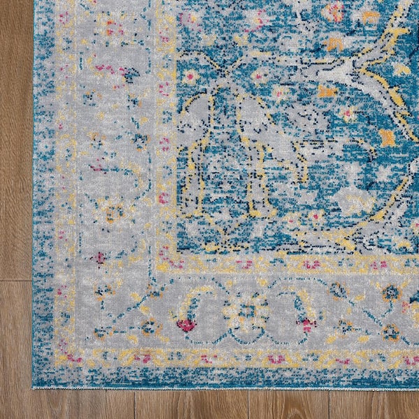 Anamica Distressed Blue/Cream 5 ft. 3 in. x 7 ft. 10 in. Turkish Border Polypropylene Indoor/Outdoor Area Rug