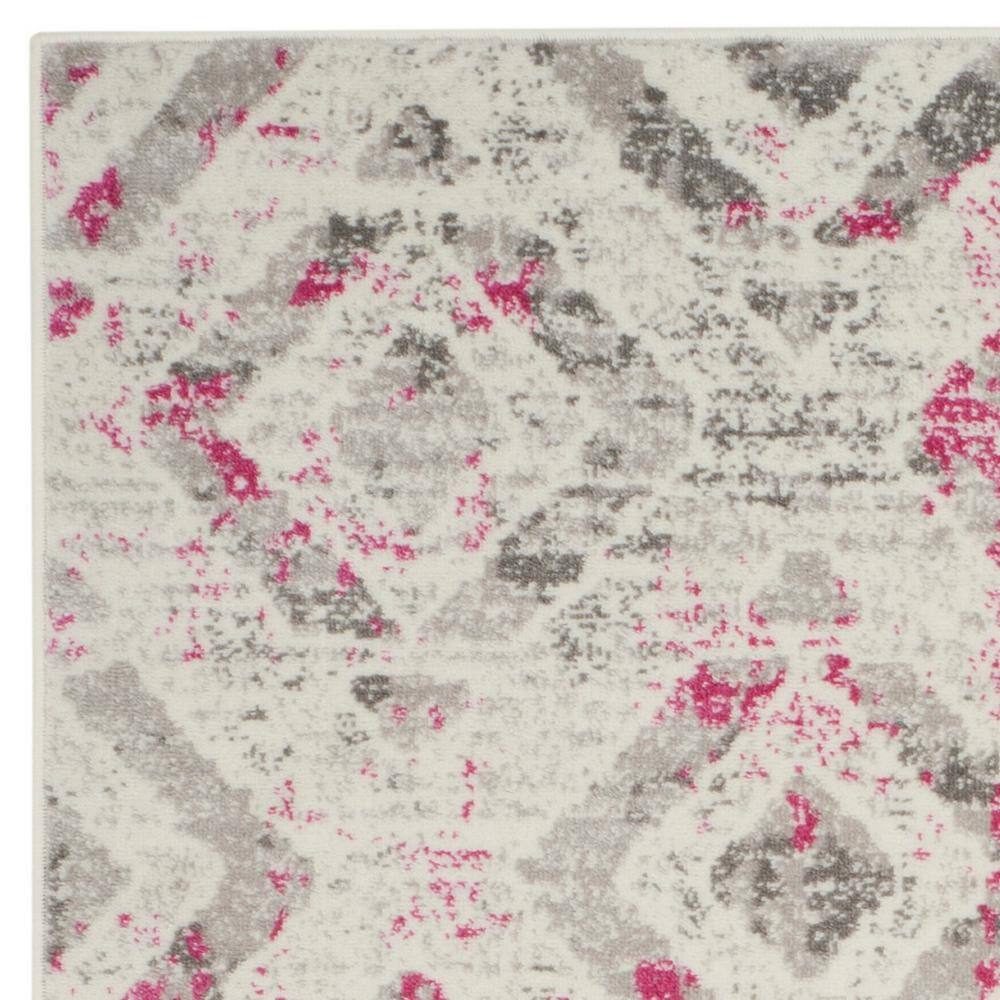 Ivory and Pink Medallion Synthetic 5' x 7' Area Rug