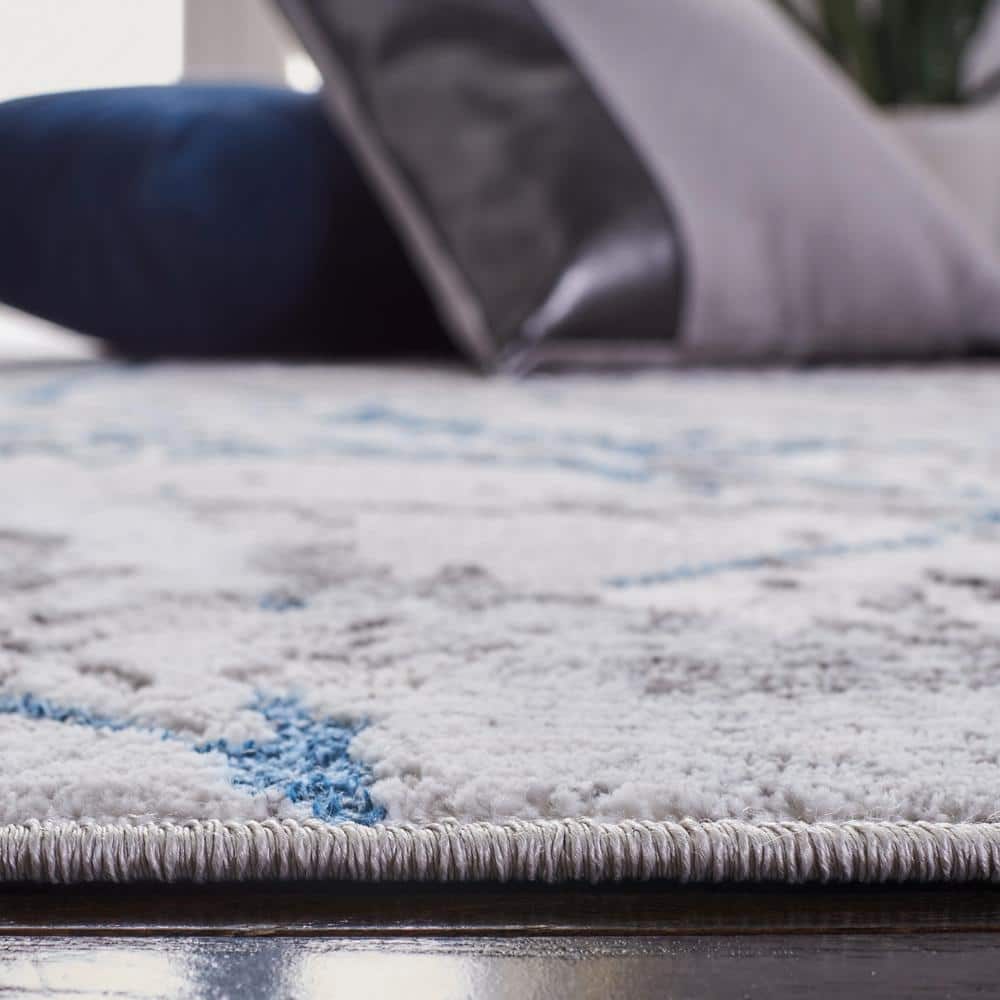 Grey and Blue Abstract Synthetic 9' x 12' Area Rug