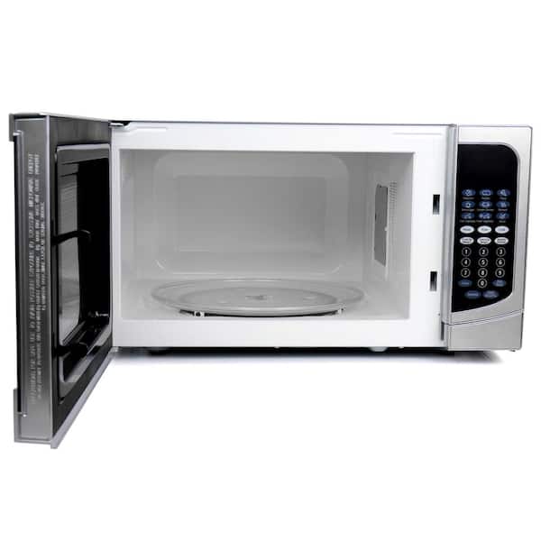 https://images.thdstatic.com/productImages/e1e4f7c2-ad83-4089-92ff-e9cca8cc8ab5/svn/stainless-steel-trim-silver-cabinet-oster-countertop-microwaves-985115673m-1f_600.jpg