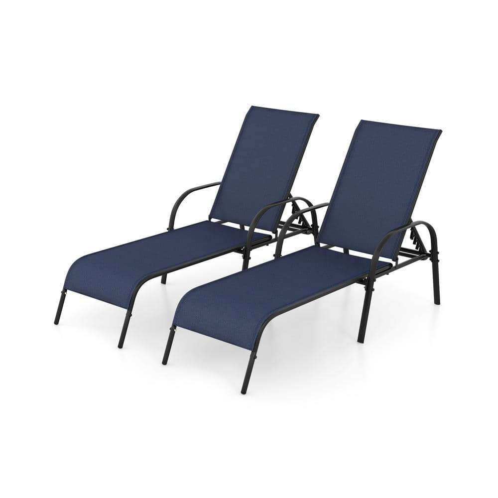 Two navy outdoor chaise lounges side by side on white.