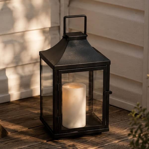 H12 in. Outdoor Solar Lantern with Flickering LED Candle Black Metal Tempered Glass Waterproof Hanging Lantern for Patio