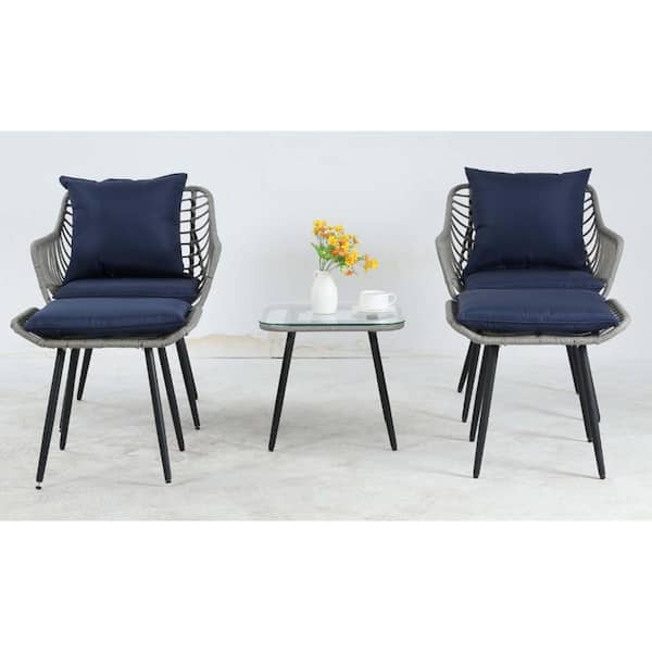 Zeus & Ruta 5-Pieces Gray Wicker Patio Conversation Set with Blue Cushions, 1 Glass Coffee Table Ottomans Bistro Sets