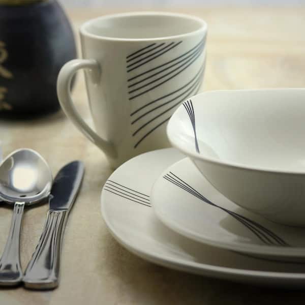 https://images.thdstatic.com/productImages/e212718b-f784-4b79-b377-a70fcce4ce58/svn/white-gibson-home-dinnerware-sets-98599949m-31_600.jpg