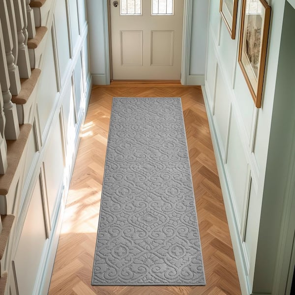 Feya Solid Light Gray 2 ft. x 6 ft. Tufted Medallion Polypropylene Runner Rug