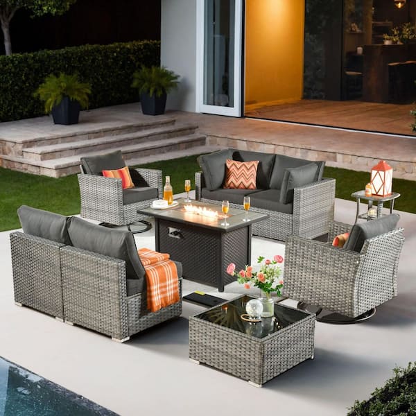 XIZZI Echo 9-Piece Wicker Patio Rectangular Fire Pit Set with Black Cushions and Swivel Rocking Chairs
