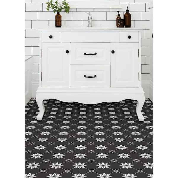 https://images.thdstatic.com/productImages/e2569a04-aaf1-48de-987a-0d073ce54484/svn/black-floorpops-vinyl-tile-flooring-tfp3990-e1_600.jpg