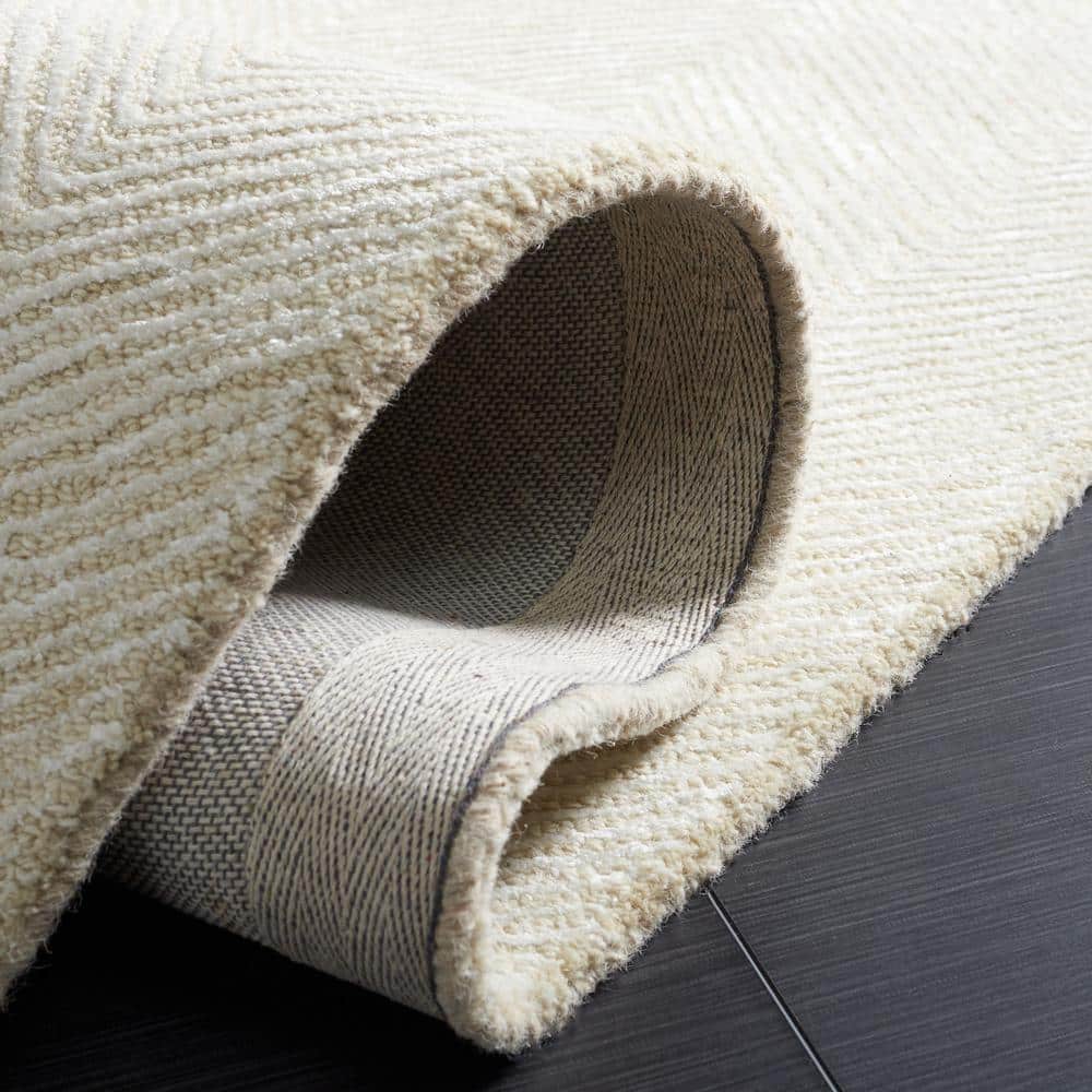 Ivory and Beige 9' x 12' Handmade Tufted Wool Viscose Rug