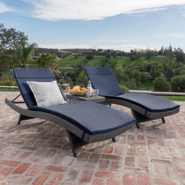 Noble House Miller Grey 3-Piece Faux Rattan Outdoor Patio Chaise Lounge and Table Set with Navy Blue Cushions