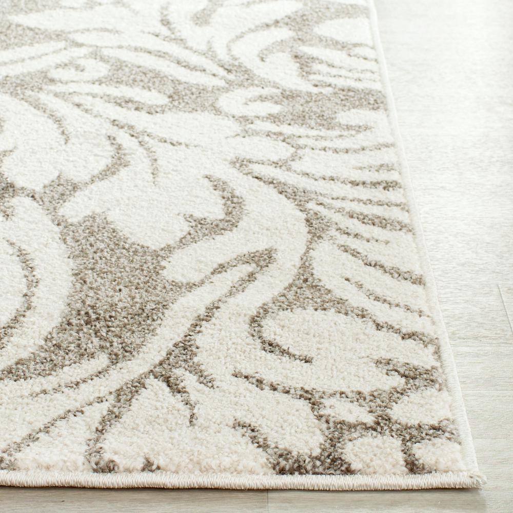 Dark Grey and Beige Floral Synthetic Area Rug