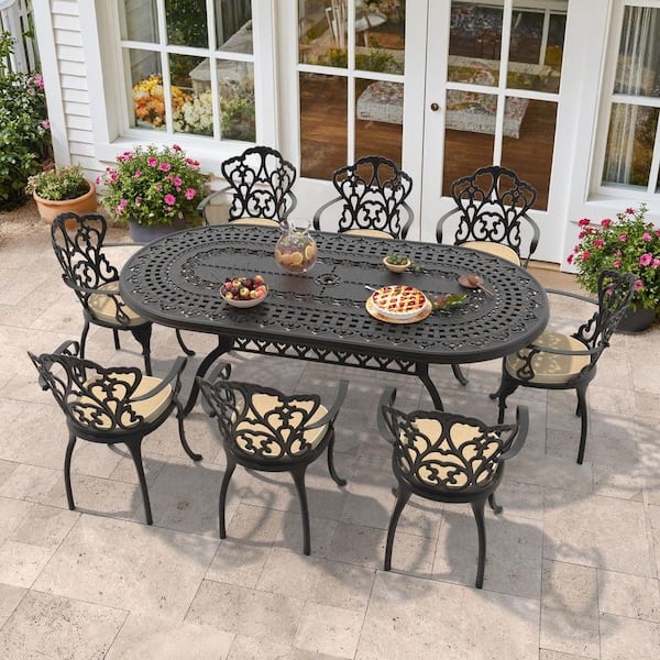 Lily Black 9-Piece Cast Aluminum Outdoor Dining Set with Oval Table and Dining Chairs with Off-white Cushion