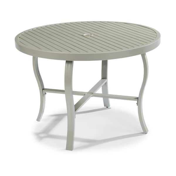 grey round outdoor dining table