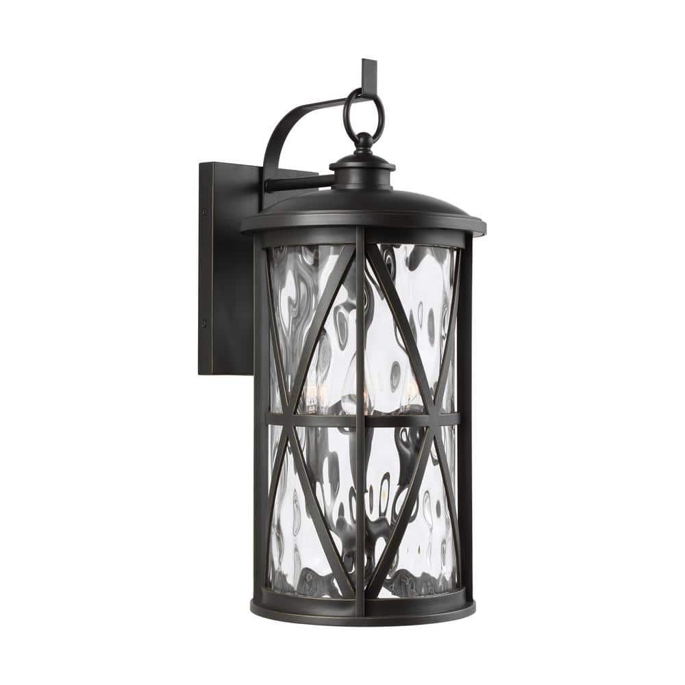 Millbrooke Antique Bronze 3-Light Outdoor Wall Lantern with Water Glass Shade