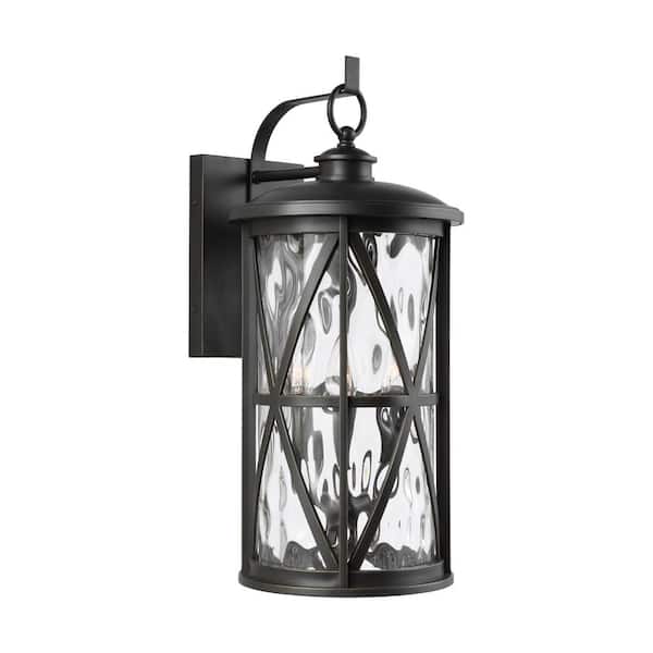 Generation Lighting Millbrooke Large 10 in. W 3-Light Antique Bronze Outdoor Wall Mount Lantern with Water Glass