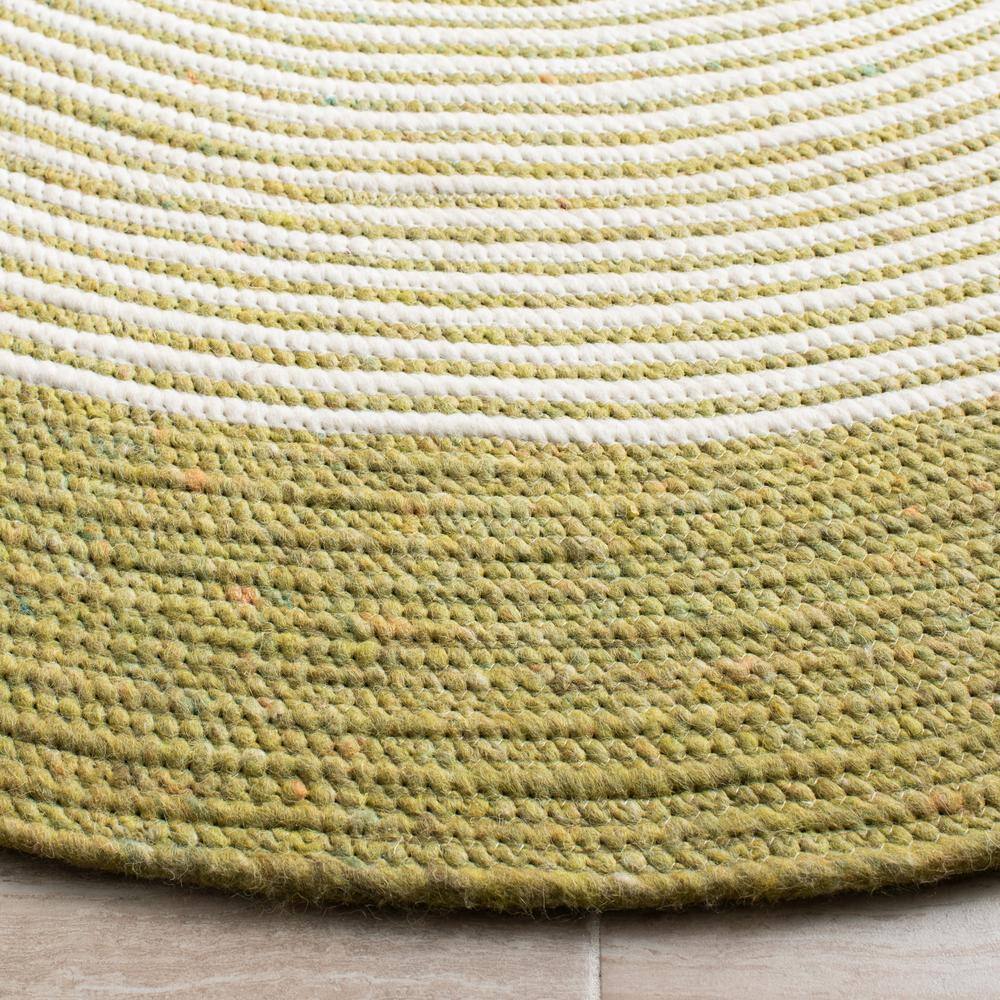 Handmade Green and Ivory Wool Oval Braided Area Rug 6' x 9'
