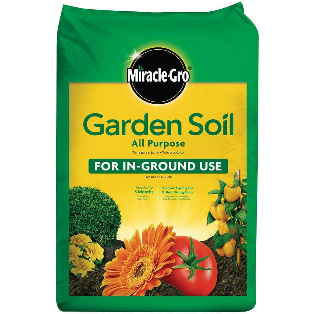 Image of Miracle-Gro Garden Soil All Purpose being used to plant a flower