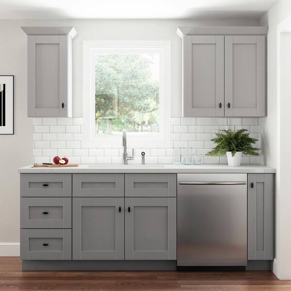 https://images.thdstatic.com/productImages/e2a6def7-d19b-5d58-a40b-61d6362e7091/svn/veiled-gray-contractor-express-cabinets-assembled-kitchen-cabinets-b33-avg-1f_600.jpg