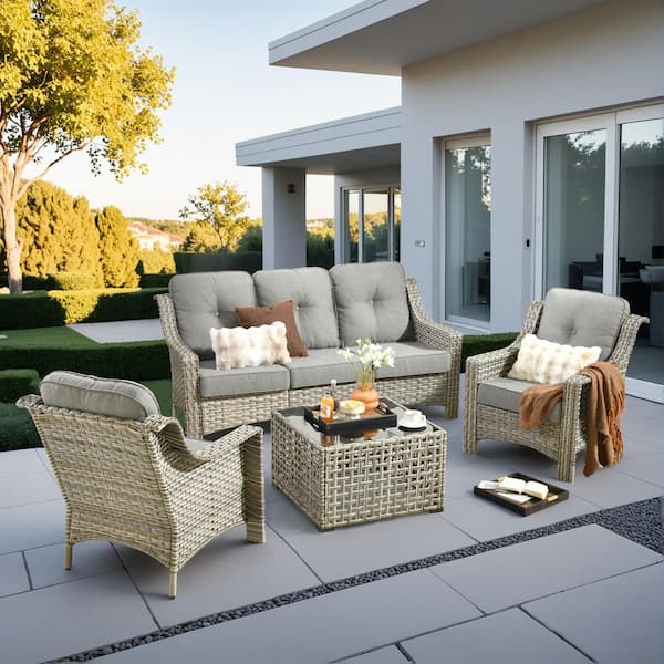 Tulip I 4-Piece Wicker Patio Conversation Set with Coffee Table and Dark Gray Cushions