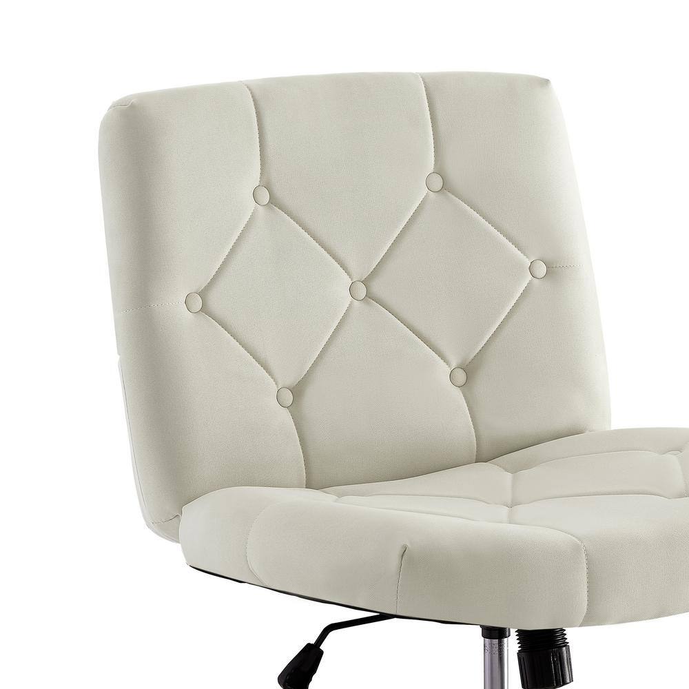 Close-up of the button-tufted backrest and seat of the beige fabric chair.