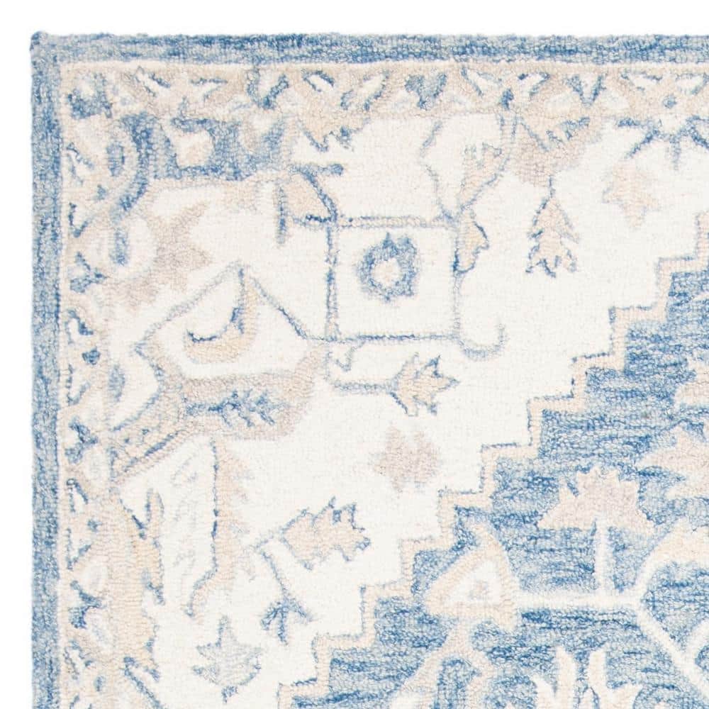 Handmade Blue and Ivory Wool 4' x 6' Tufted Area Rug