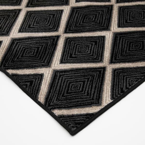 Stratford Isaak Castle/Ebony 9 in. x 33 in. Woven Polypropylene Stair Tread Cover (Set of 1)