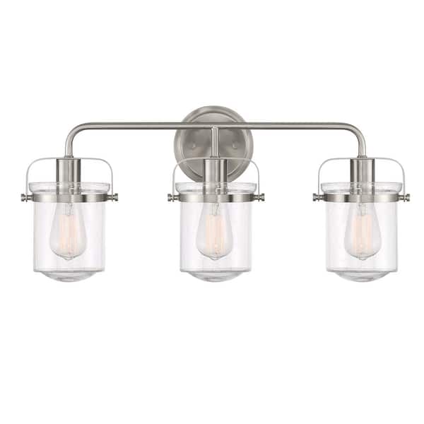 Designers Fountain Jaxon 24 in. 3-Light Brushed Nickel Industrial Vanity with Clear Glass Shades