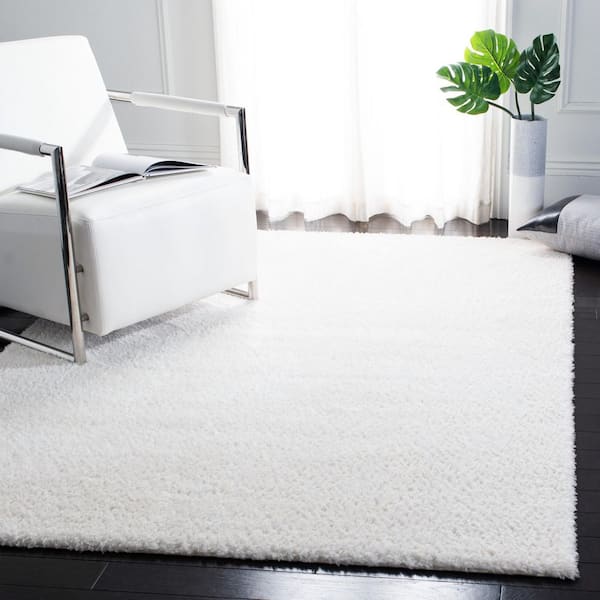 Decora Shaggy 9 ft. x 12 ft. Ivory Flokati Solid Area Rug
