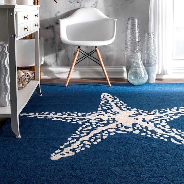 https://images.thdstatic.com/productImages/e2db6280-2f1b-434f-b82d-d77f058f544f/svn/blue-nuloom-outdoor-rugs-hjair14a-406-66_600.jpg