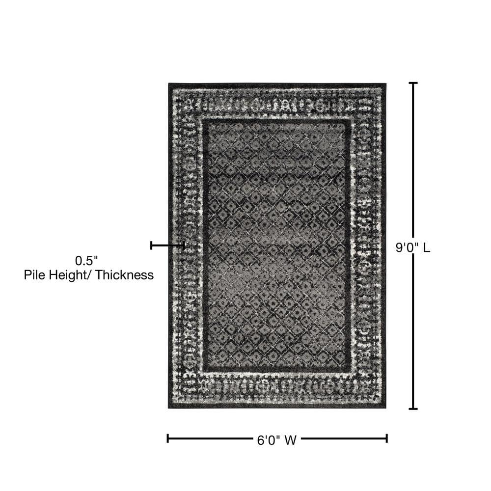 6' x 9' Black and Silver Synthetic Reversible Area Rug