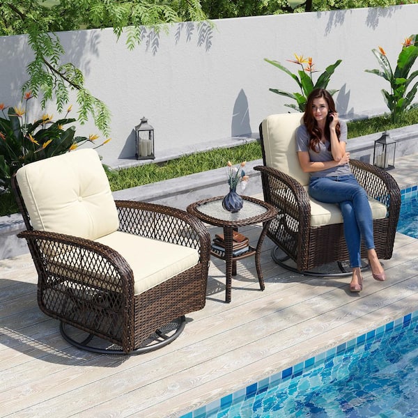 3-Piece Brown Wicker Patio Swivel Outdoor Rocking Chair Set with Blue Cushions and Table