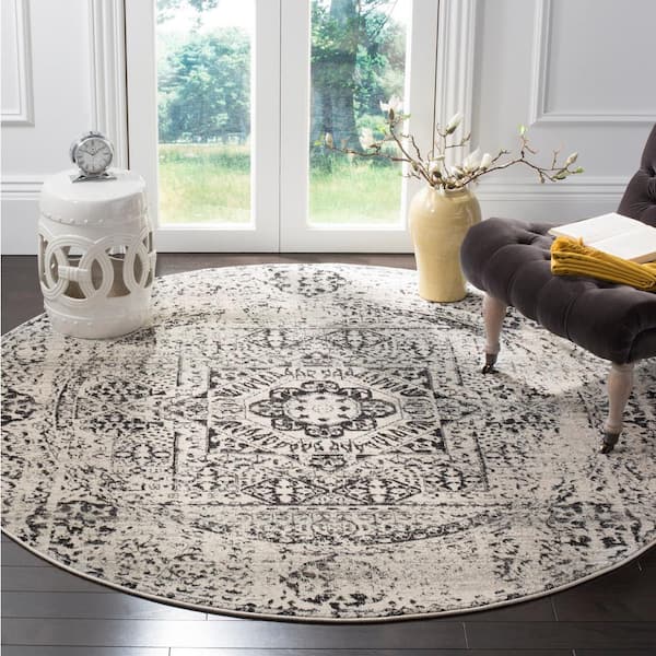 Evoke 5 ft. x 5 ft. Ivory/Black Distressed Medallion Round Area Rug