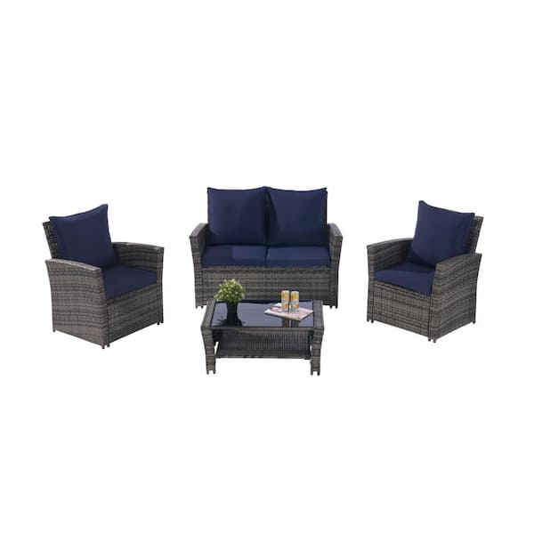 Zeus & Ruta 4-Piece Wicker Patio Conversation Set with Tempered Glass Coffee Table, Dark Blue Cushions for Porch, Garden, Balcony
