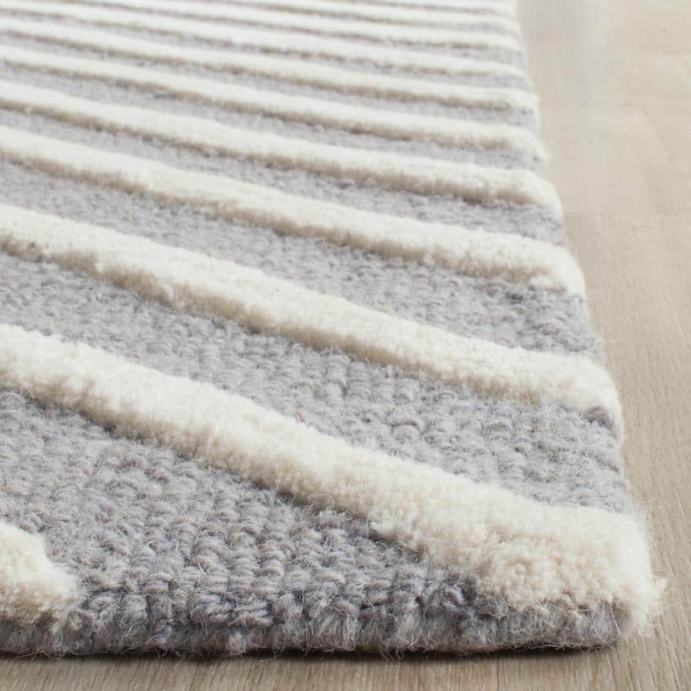 Handmade Silver & Ivory Wool 8' x 10' Tufted Area Rug