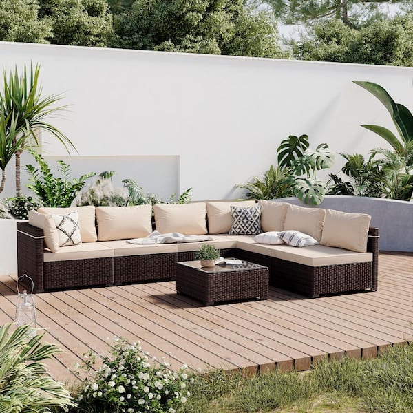 7-Piece Wicker Patio Conversation Sofa Set with Beige Cushions and Coffee Table