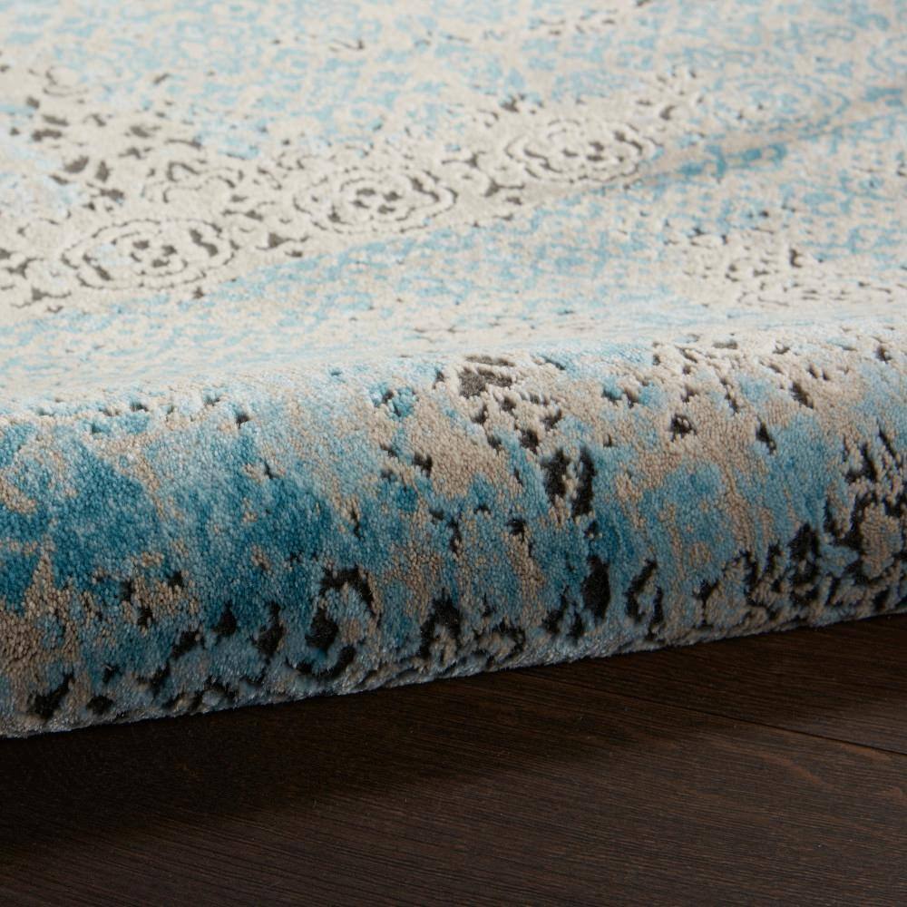 Blue 5' x 7' Stain-Resistant Synthetic Rectangular Area Rug
