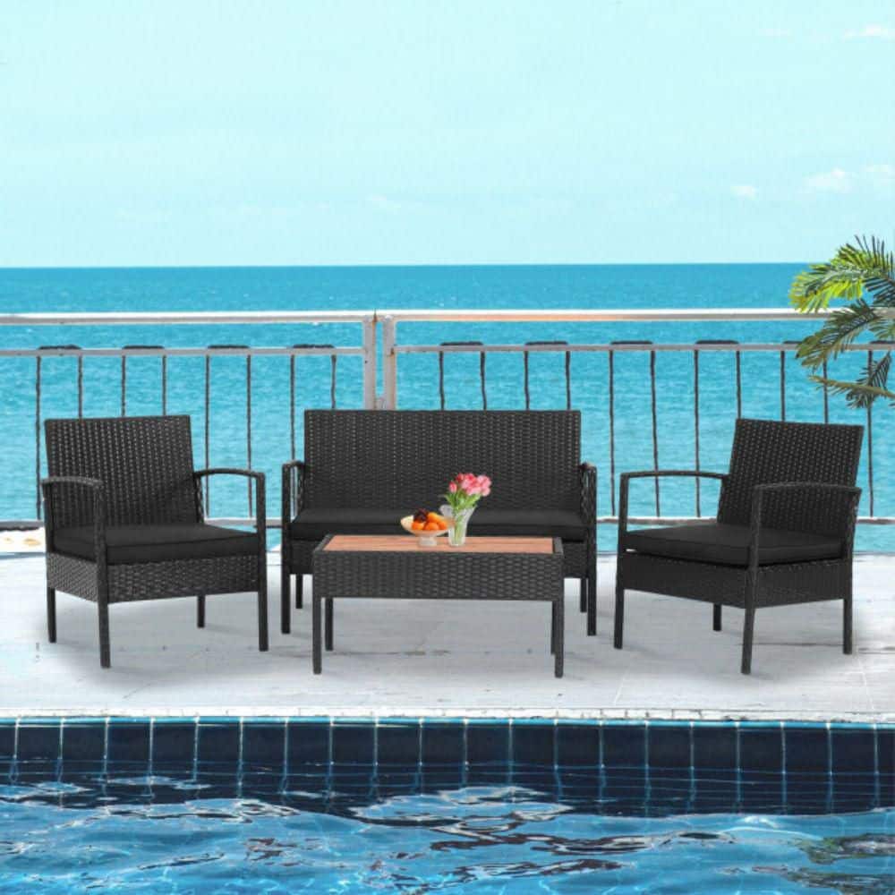 Black 4-Piece Rattan Patio Furniture Set with Acacia Wood Tabletop