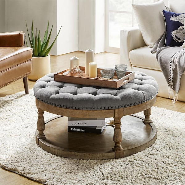 Enipeus Transitional Grey Polyester Storage Button-tufted Round Small Ottoman with Solid Wood Legs and Nailhead Trim
