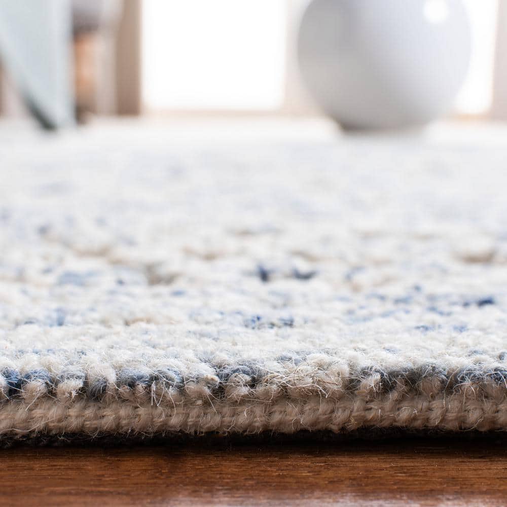 Ivory and Blue Hand-Tufted Wool 8' x 10' Area Rug