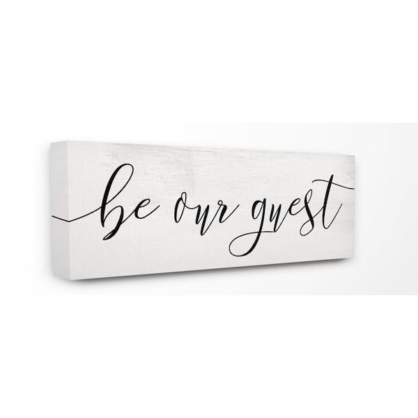 Stupell Industries 13 in. x 30 in. "Be Our Guest Script White Wood Look Typography" by Daphne Polselli Canvas Wall Art